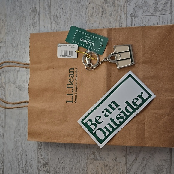 L.L. Bean Handbags - NWT L.L. Bean Boat And Tote Charm Key Chain And Be An Outsider Sticker